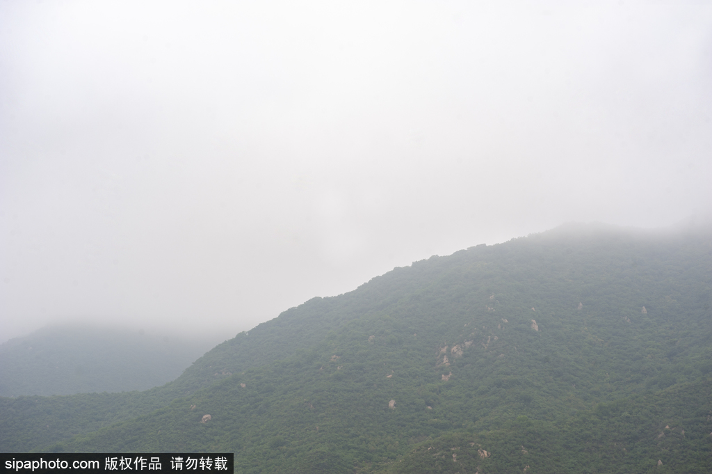 安四路上看山景 端午降雨享清凉